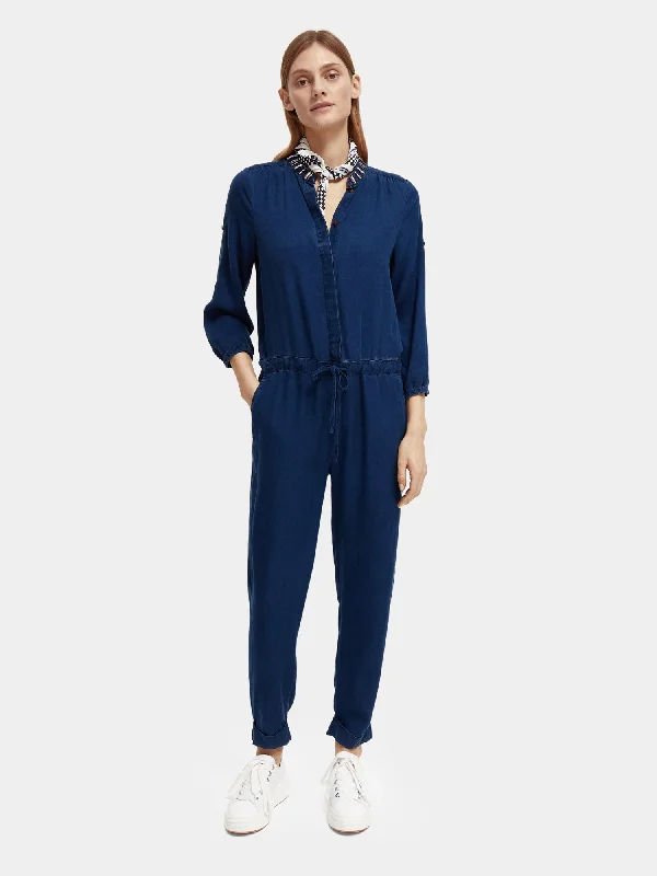 Women jumpsuits with a criss - cross back for a flirty and eye - catching detailBeaded indigo jumpsuit