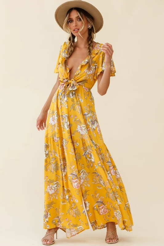 Women jumpsuits with tassel trims for a playful and fashionable touchKasey Tied Bust Wide Leg Floral Print Jumpsuit Mustard