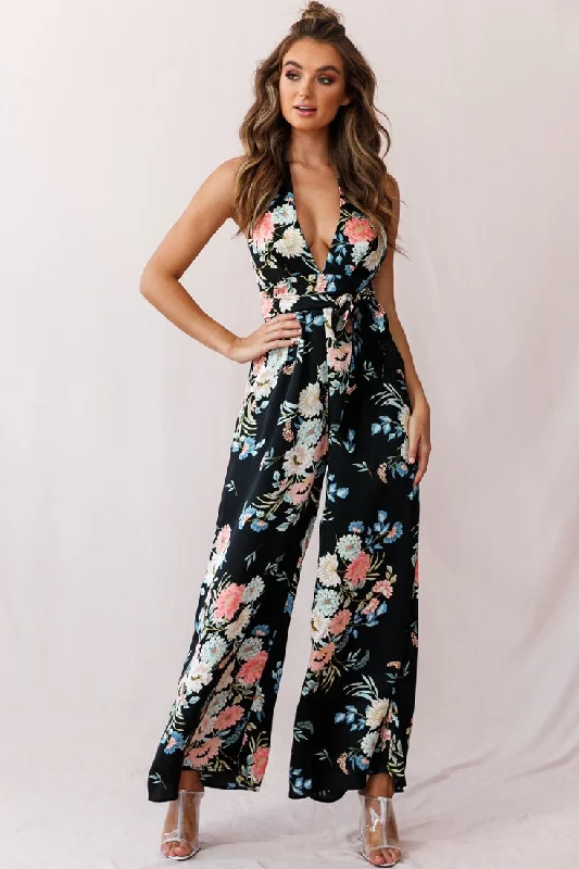 Metallic women jumpsuits for a dazzling New Year's Eve partyMake Me Halterneck Low Back Jumpsuit Floral Print Black