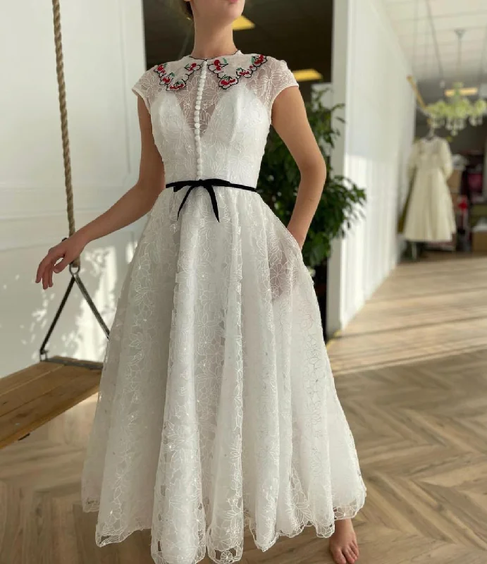 Midi dresses with pleated skirts for a timeless and elegant appealCherry Lace Bridal Dress