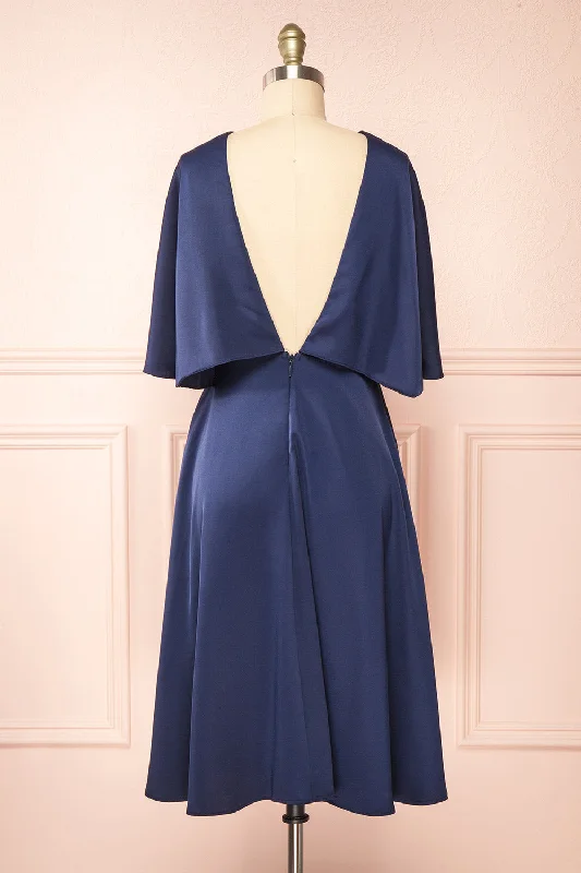 Midi dresses with ruched sleeves for a more fitted and stylish arm lookTordis Navy | Satin Midi Dress w/ Bell Sleeves