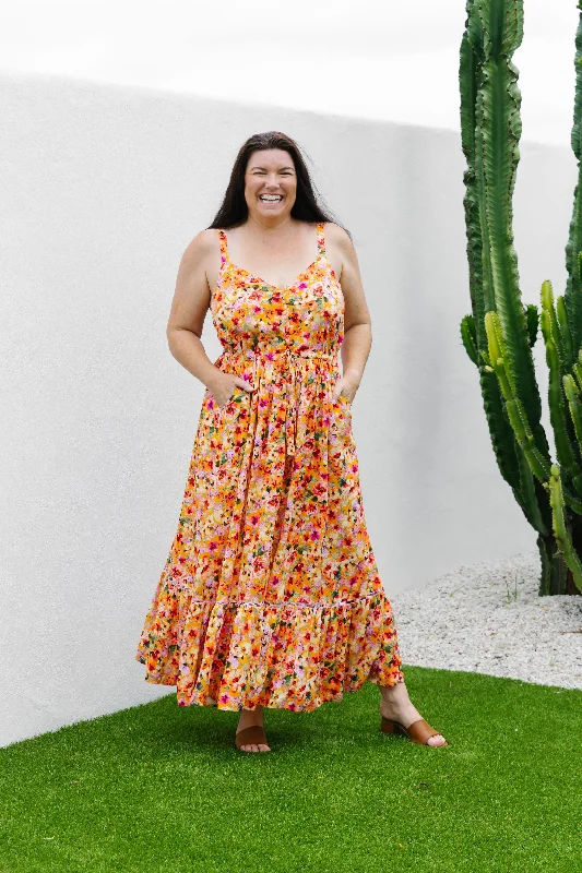 Strapless maxi dresses for a beachside vacationApril Maxi Dress in Sunshine Floral