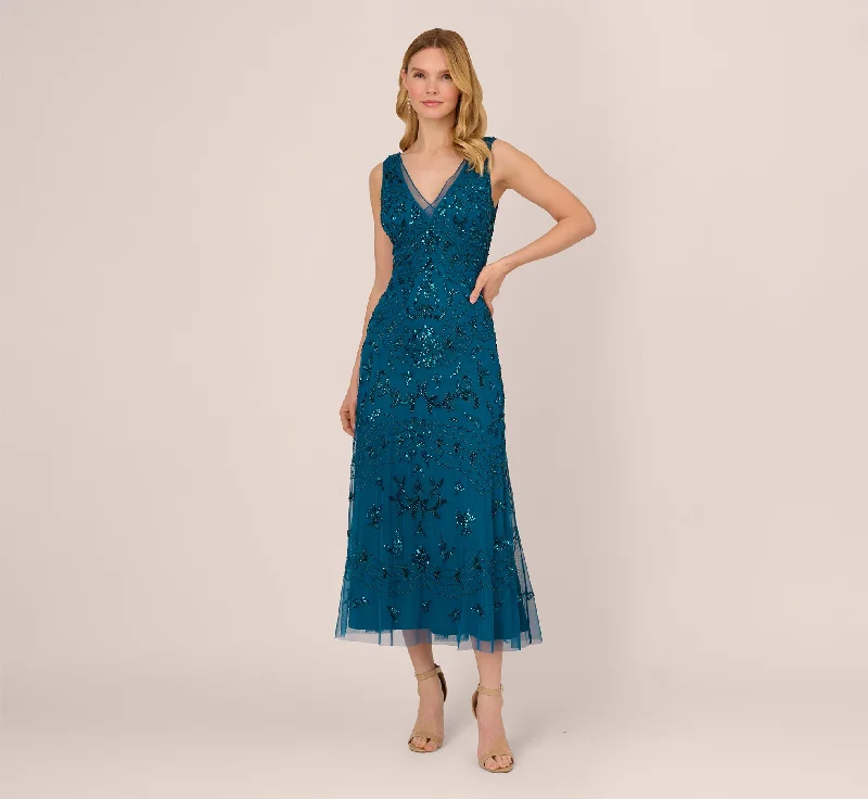 Maxi dresses with a gathered skirt for a voluminous and dramatic effectHand-Beaded Ankle-Length Dress In Teal Sapphire