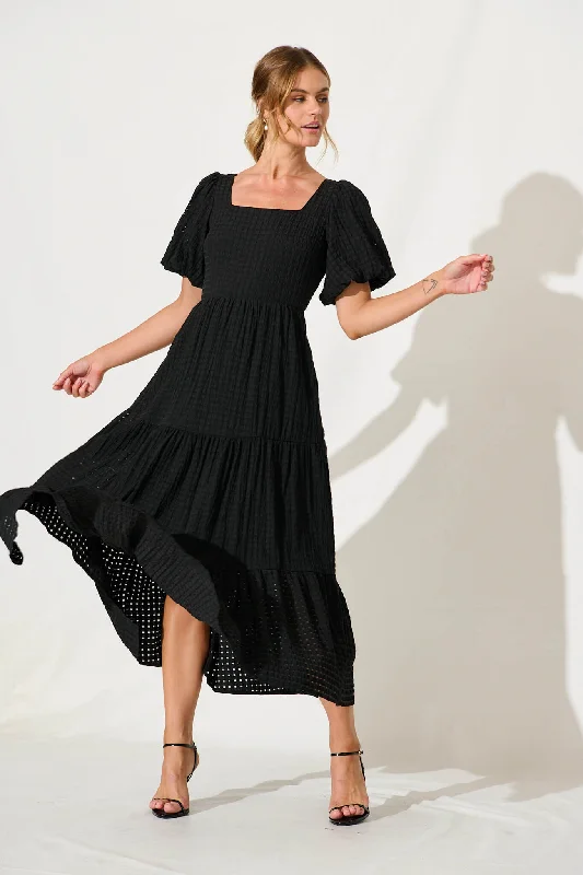 Maxi dresses with a criss - cross back for a flirty and unique detailZoya Maxi Dress In Black Cotton Blend