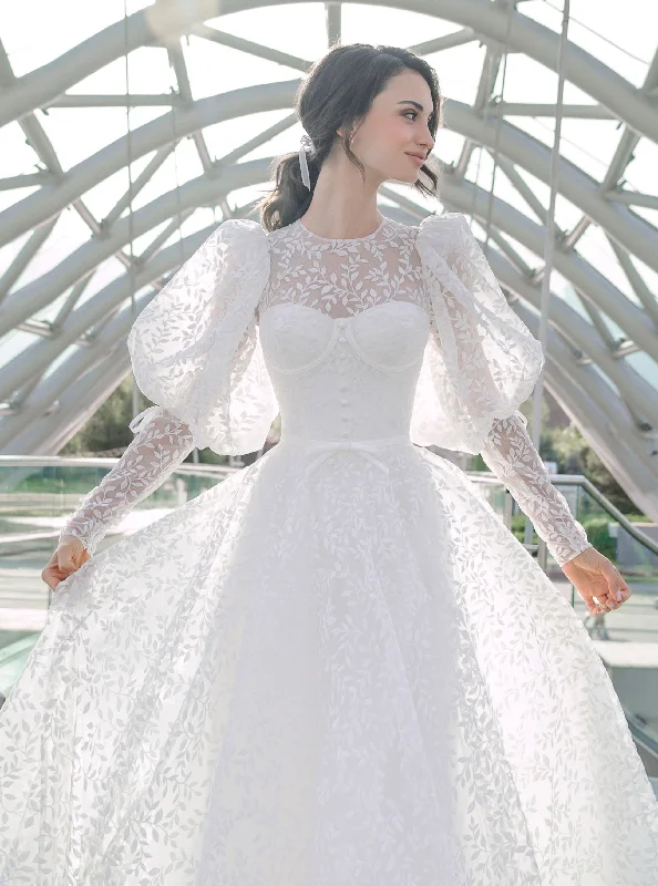 Wedding guest dresses with abstract prints and long trainsLong Puffy Sleeve Lace Wedding Dress