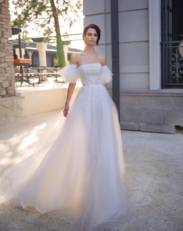 Wedding guest dresses with pom - pom trims for a playful lookStrapless Glitter Wedding Gown with Removable Short Puffy Sleeves