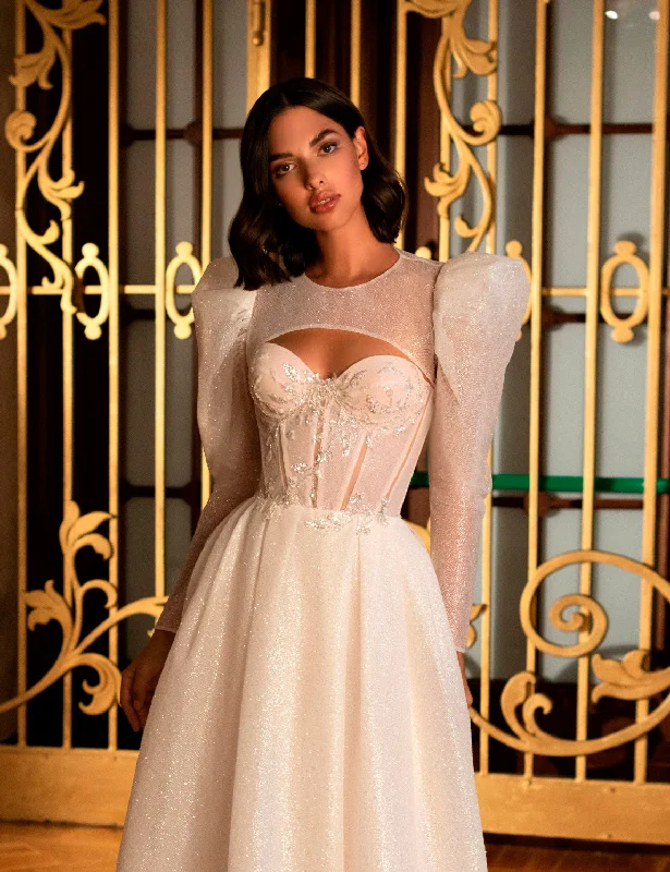 Sleeveless wedding guest dresses with ruffled hemsStrapless Sweetheart Wedding Gown With Bolero